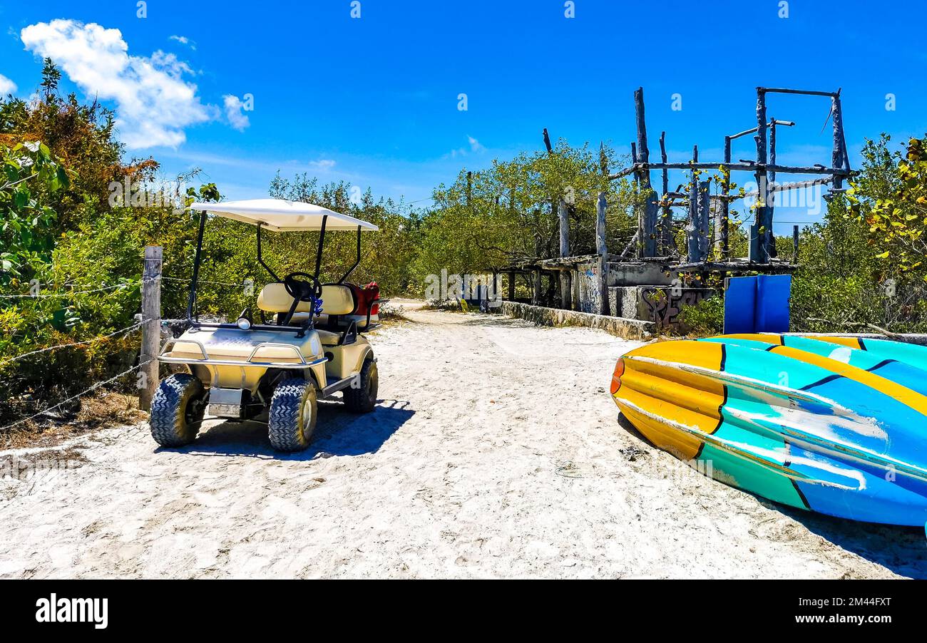 Canoes and boats for water activities on the beach on Isla Holbox
