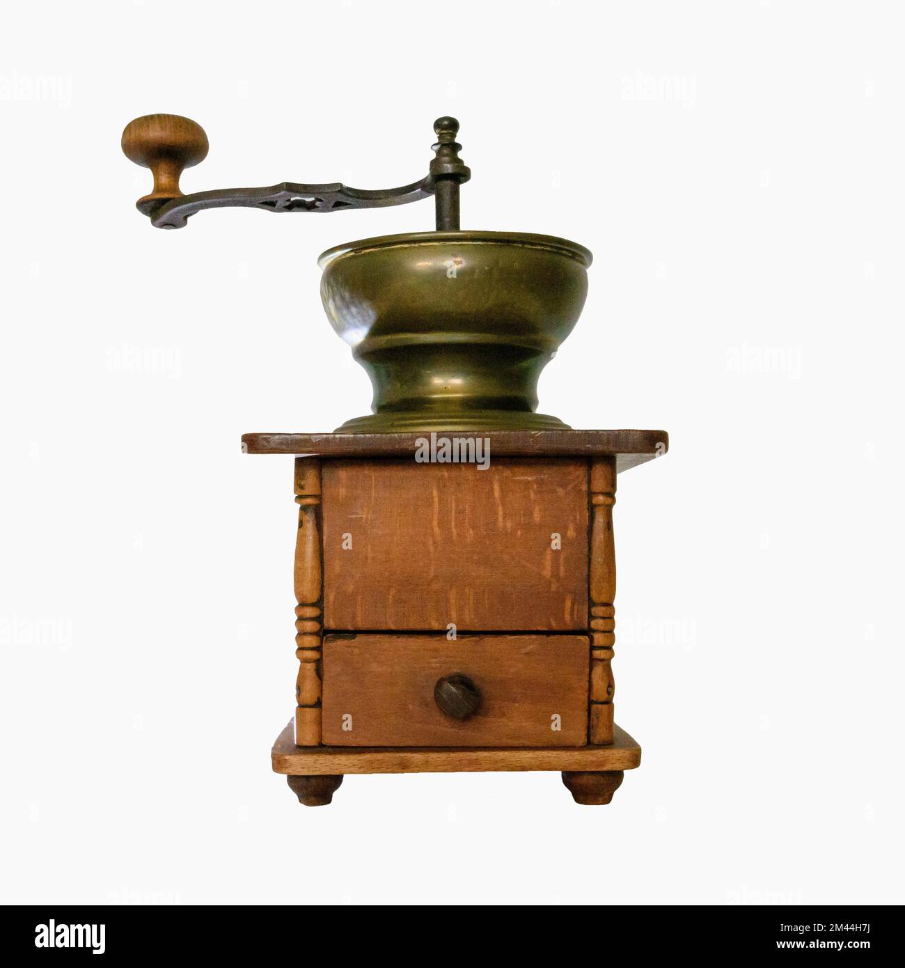 Antique manual coffee grinder isolated on white background Stock Photo