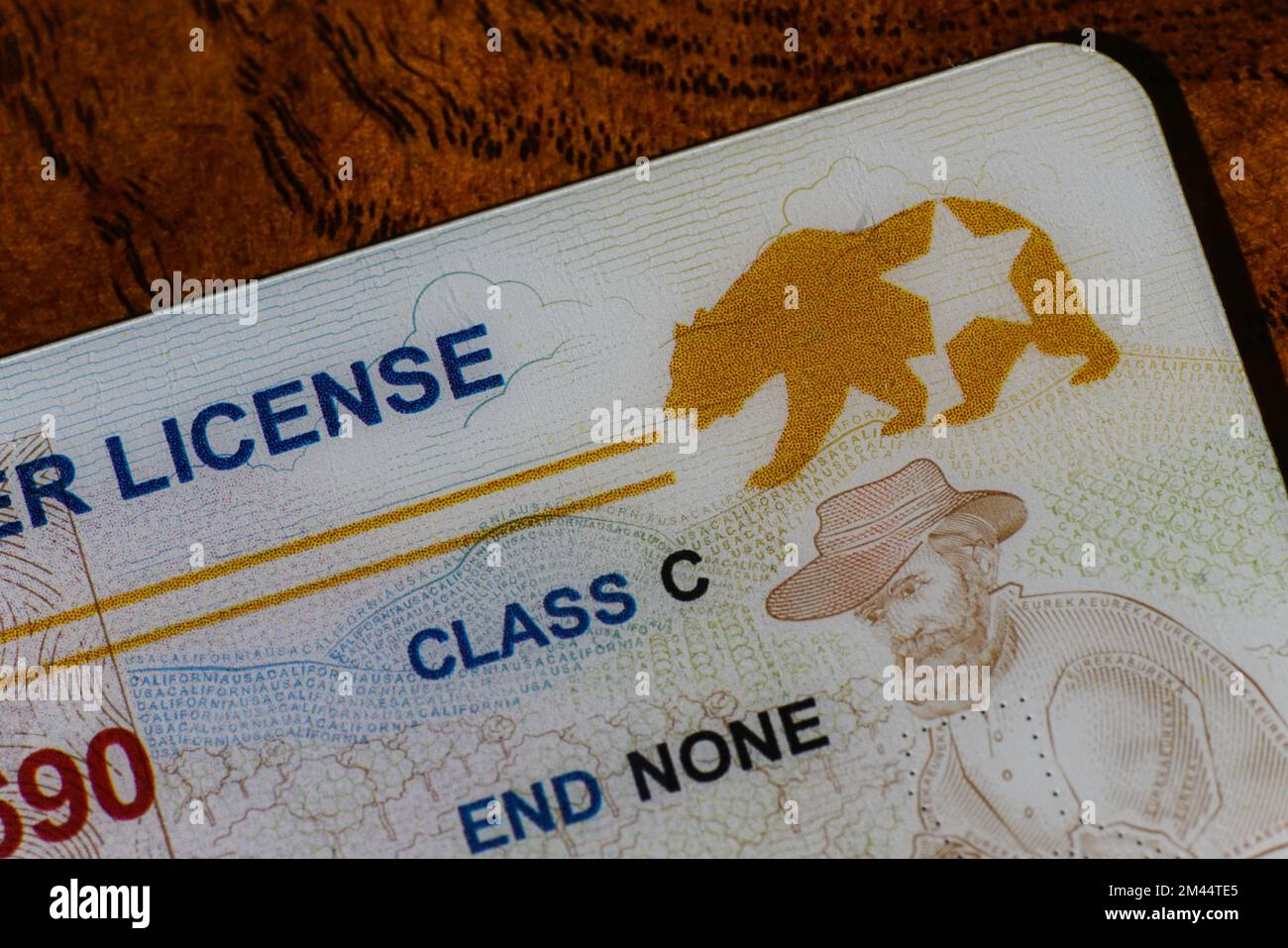 Lake Elsinore, California, USA - Dec 18, 2022: Closeup of California Real ID driver license focusing on the REAL ID logo Stock Photo