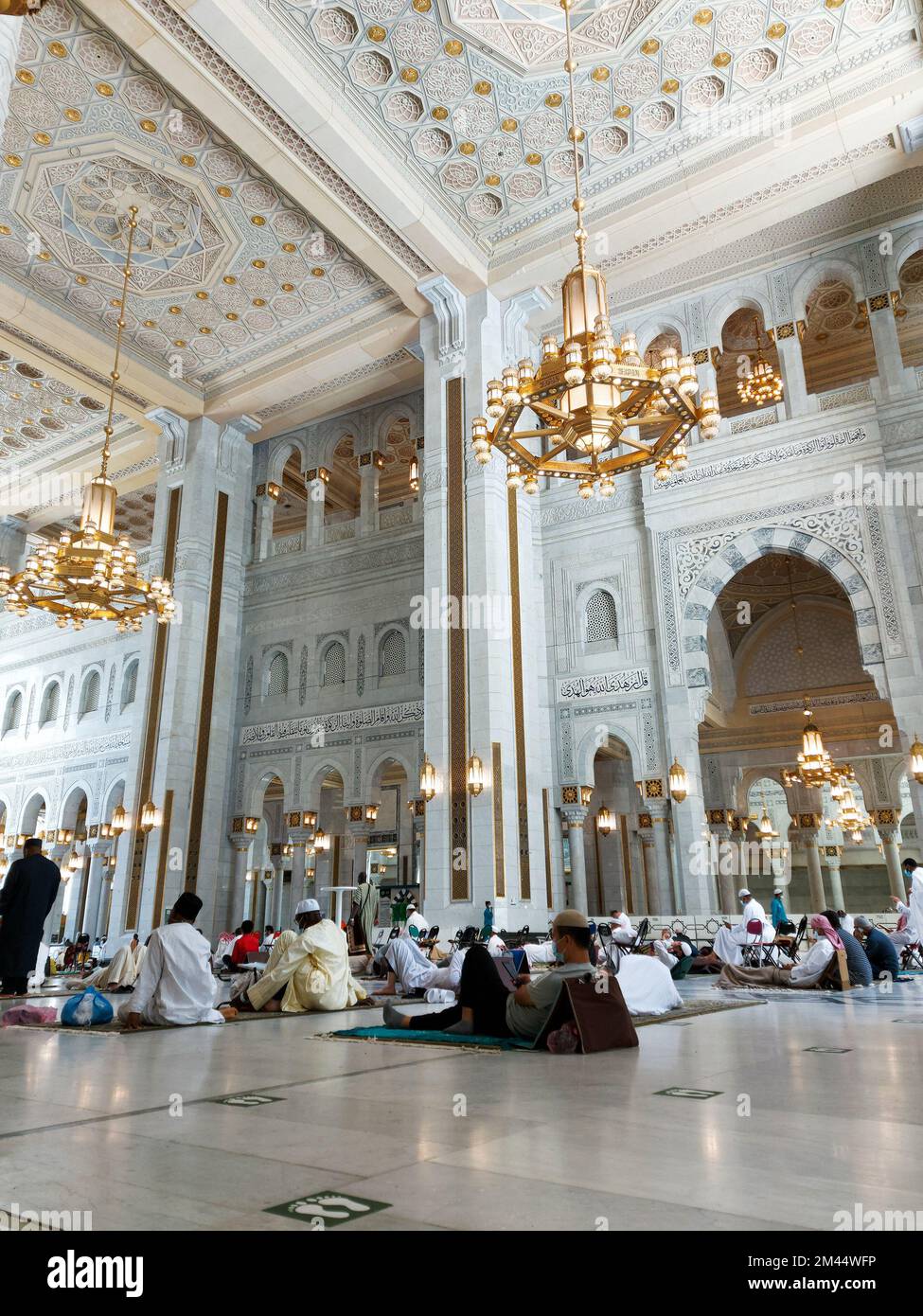 Mecca , Saudi Arabia 12 May 2021 , Muslim prayers at Makkah - Al Haram mosque from inside Stock Photo