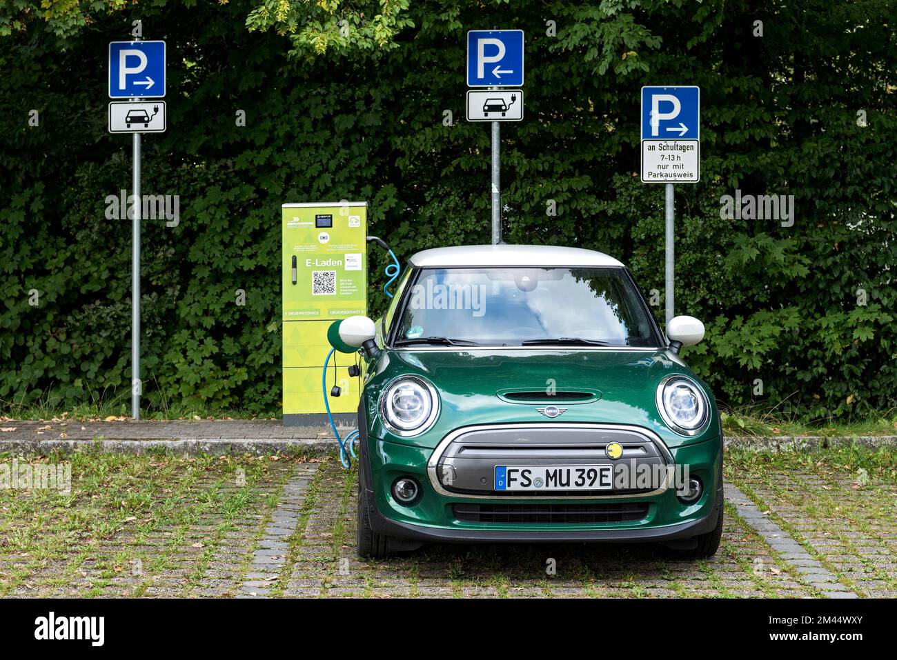 fe analogi galleri Car park with charging station, car, mini, electric car is charged at  charging station, Germany Stock Photo - Alamy