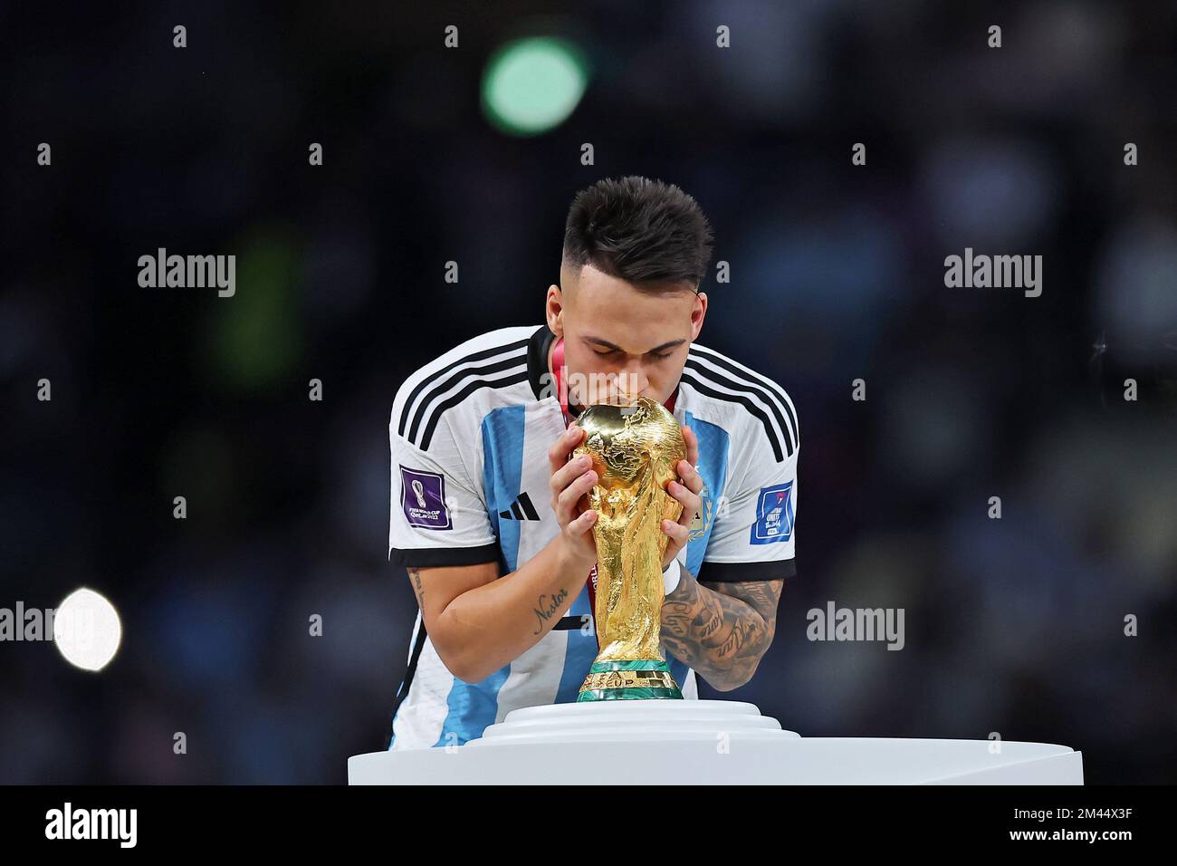 Lusail Iconic Stadium, Lusail, Qatar. 18th Dec, 2022. FIFA World Cup  Football Final Argentina versus France; Alexis Mac Allister of Argentina  lifts the world cup trophy Credit: Action Plus Sports/Alamy Live News