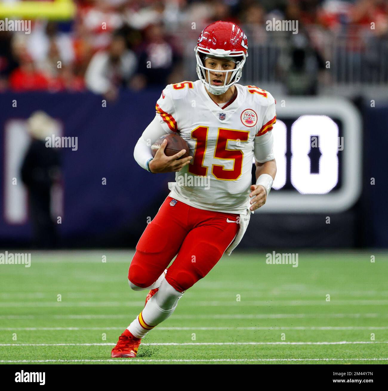 December 18, 2022: Kansas City Chiefs quarterback Patrick Mahomes (15)  carries the ball to set up a potential game-winning field goal near the end  of regulation in an NFL game between the