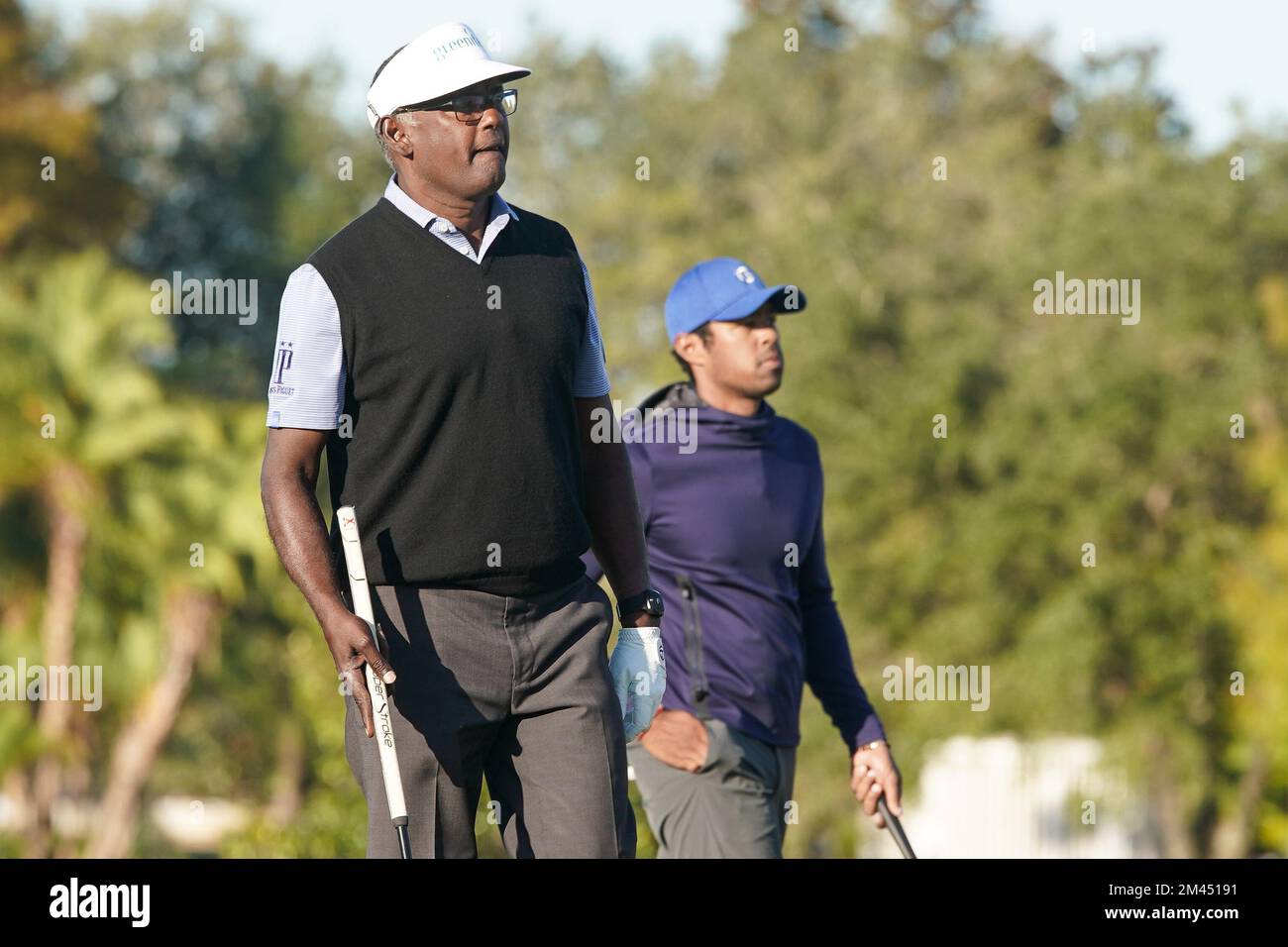 Orlando, Florida, USA. 18th Dec, 2022. Vijay Singh (L) and his son Qass