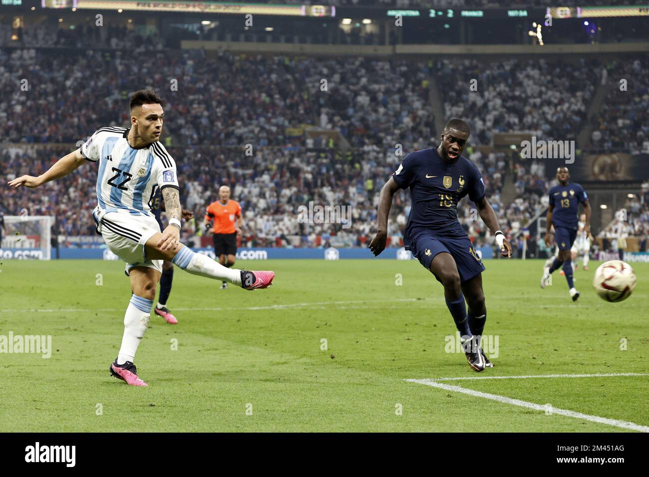 AL DAAYEN - (l-r) Lautaro Martinez of Argentina, Dayot Upamecano of France during the FIFA World Cup Qatar 2022 final match between Argentina and France at Lusail Stadium on December 18, 2022 in Al Daayen, Qatar. AP | Dutch Height | MAURICE OF STONE Stock Photo
