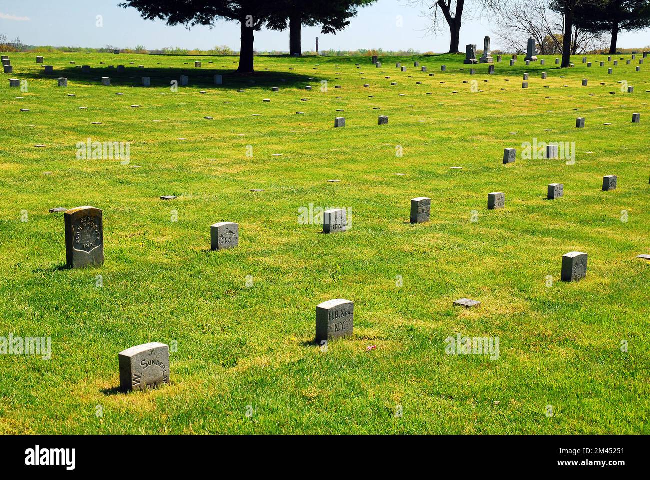 Graves of the American Civil War dead are marked with simple stone slabs at the Fredericksburg National Cemetery in Virginia Stock Photo