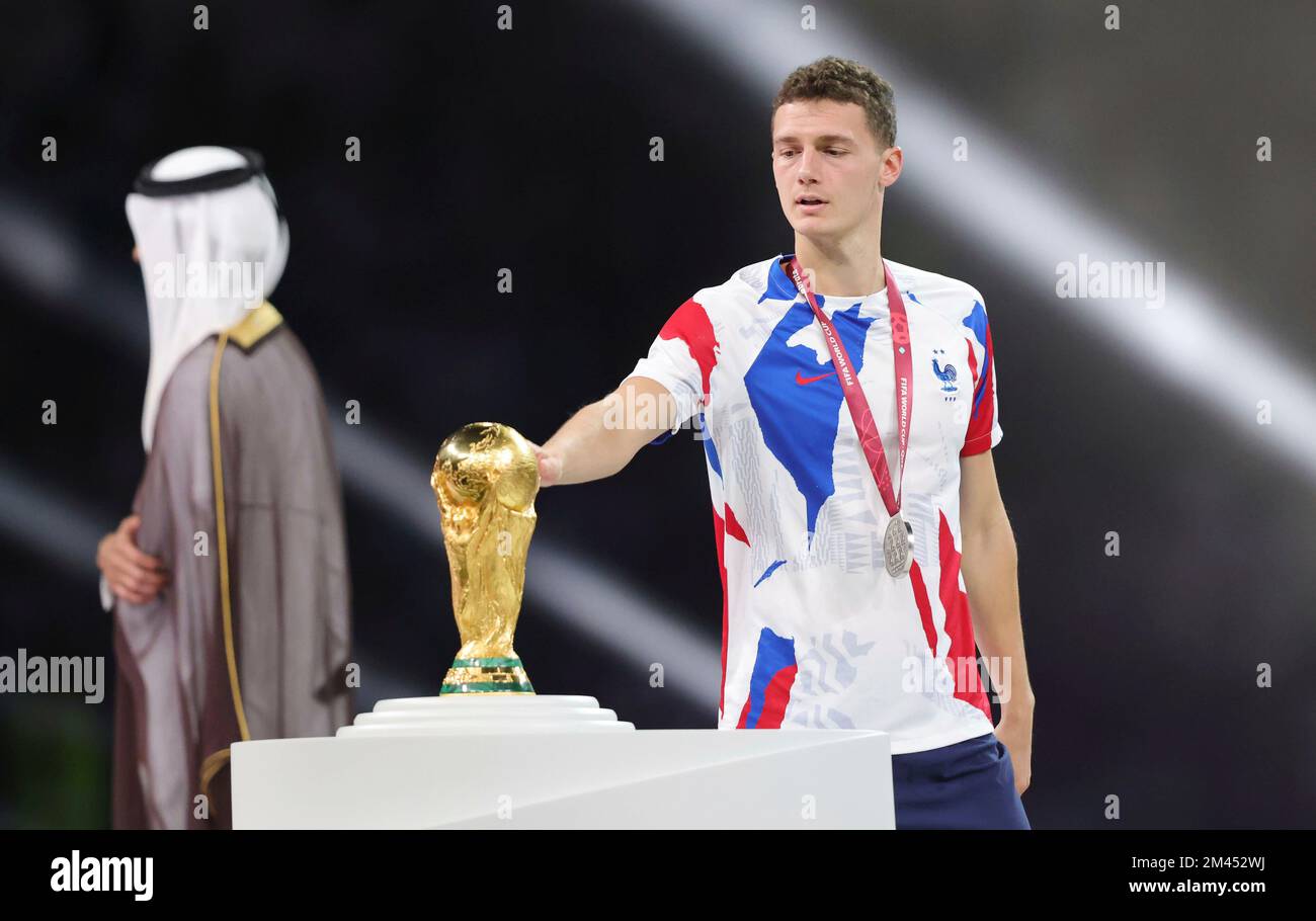 Award ceremony: UPAMECANO Dayot (FRA) walks past the trophy, cup, trophy,  disappointment, frustrated, disappointed, frustrated, rejected, left:  GUENDOUZI Matteo (FRA). Game 64, FINAL Argentina - France 4-2 nE (3-3) on  December 18th