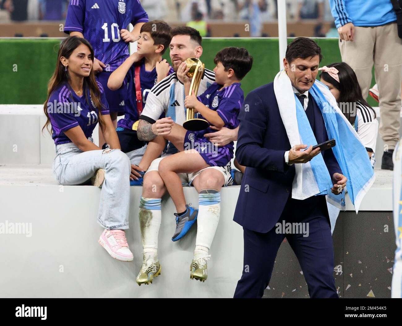 Qatar - 18/12/2022, Lionel Messi of Argentina with his wife Antonella Roccuzzo and their sons, right former player Javier Zanetti following the FIFA World Cup 2022, Final football match between Argentina and France on December 18, 2022 at Lusail Stadium in Al Daayen, Qatar - Photo Jean Catuffe / DPPI Stock Photo