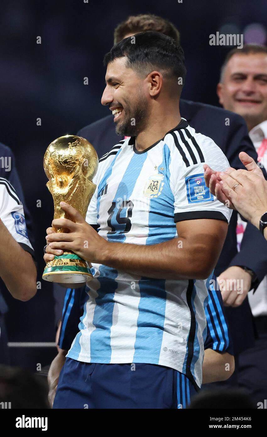 Qatar - 18/12/2022, Sergio Kun Aguero of Argentina - holding the World Cup - and teammates celebrate during the trophy ceremony following the FIFA World Cup 2022, Final football match between Argentina and France on December 18, 2022 at Lusail Stadium in Al Daayen, Qatar - Photo Jean Catuffe / DPPI Stock Photo