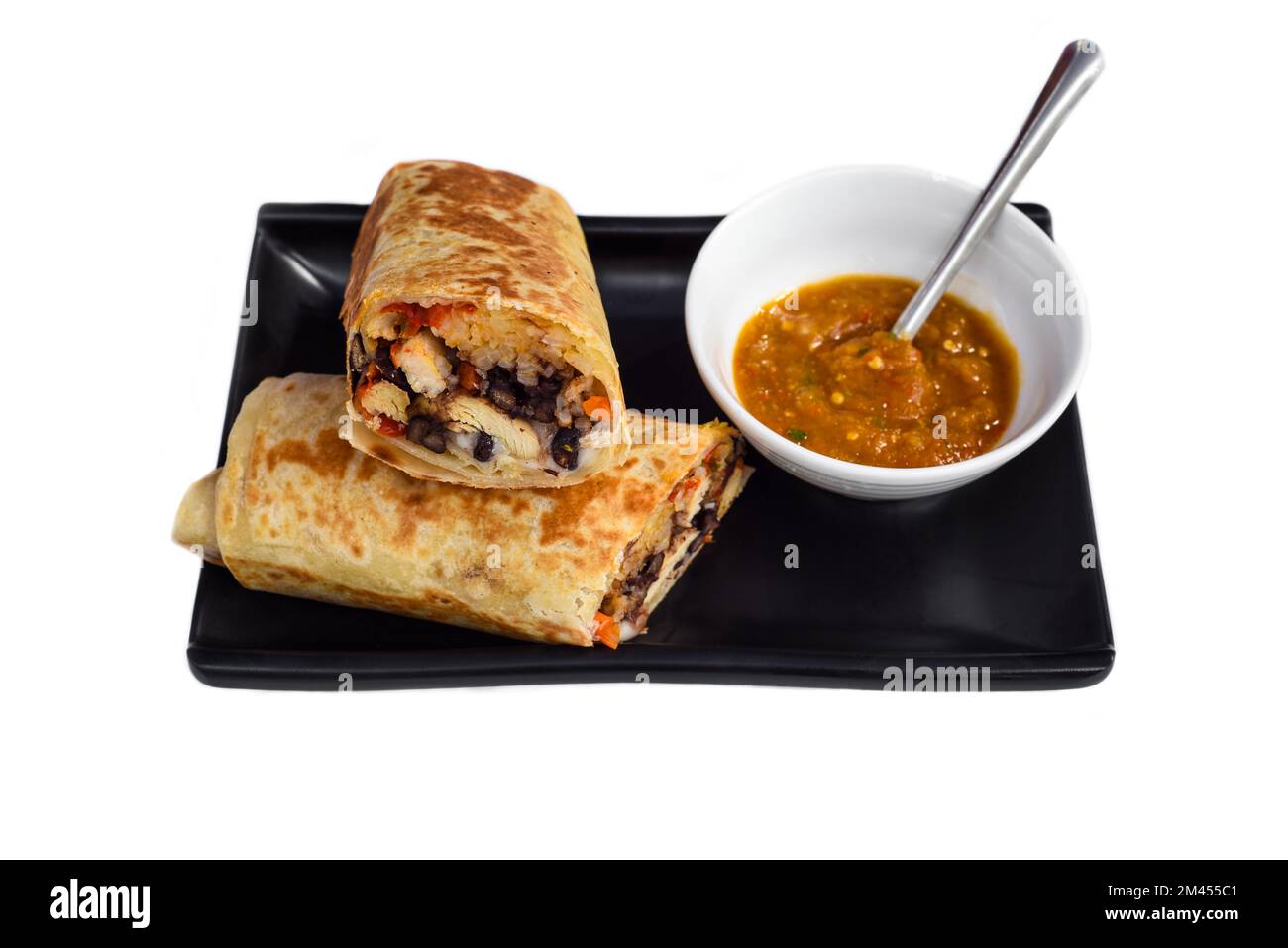 Mexican burrito with chicken, cheese, beans,rice served with sauce