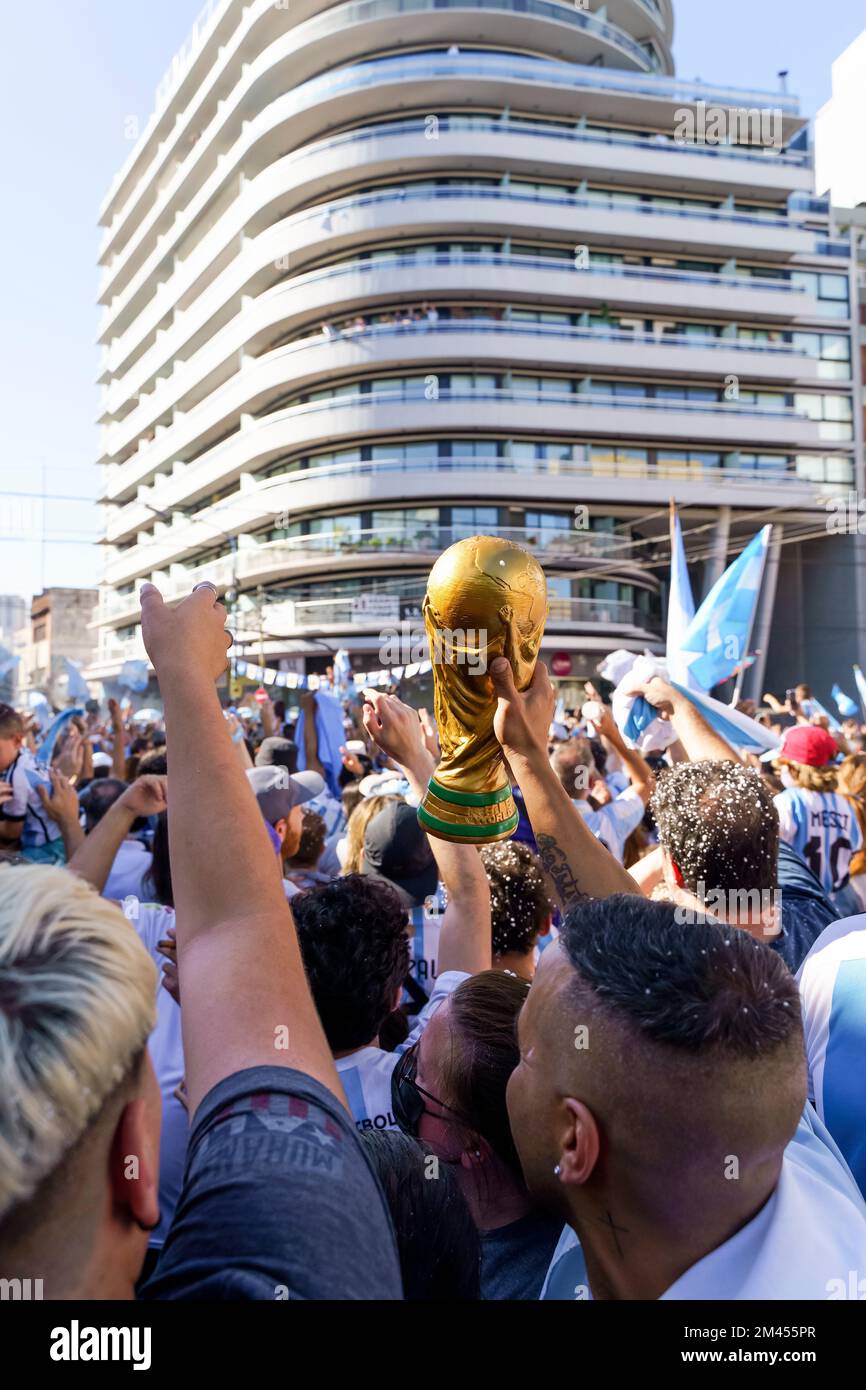 Buenos Aires, Argentina - December 18, 2022: Happy Argentine football fans celebrate winning a final football match at the Qatar 2022 FIFA World Cup. High quality photo Stock Photo