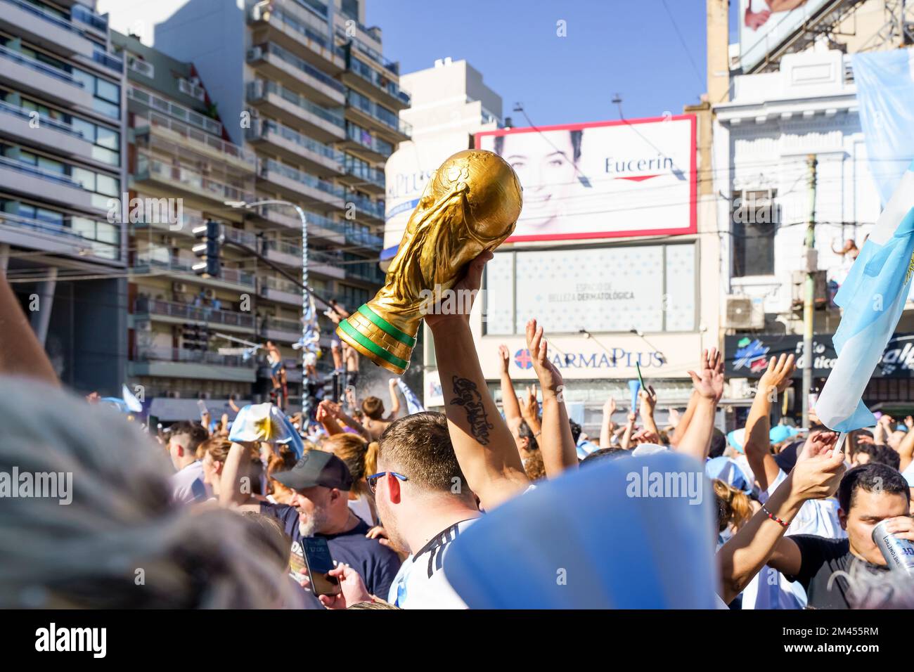 Buenos Aires, Argentina - December 18, 2022: Happy Argentine football fans celebrate winning a final football match at the Qatar 2022 FIFA World Cup. High quality photo Stock Photo