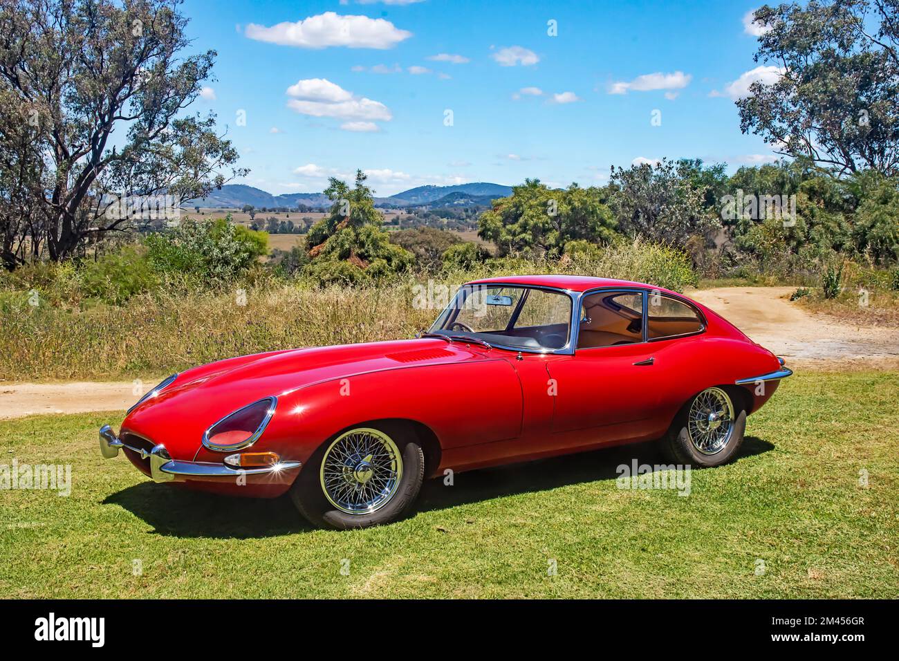 A red 1962 E Type Jaguar FHC Stock Photo