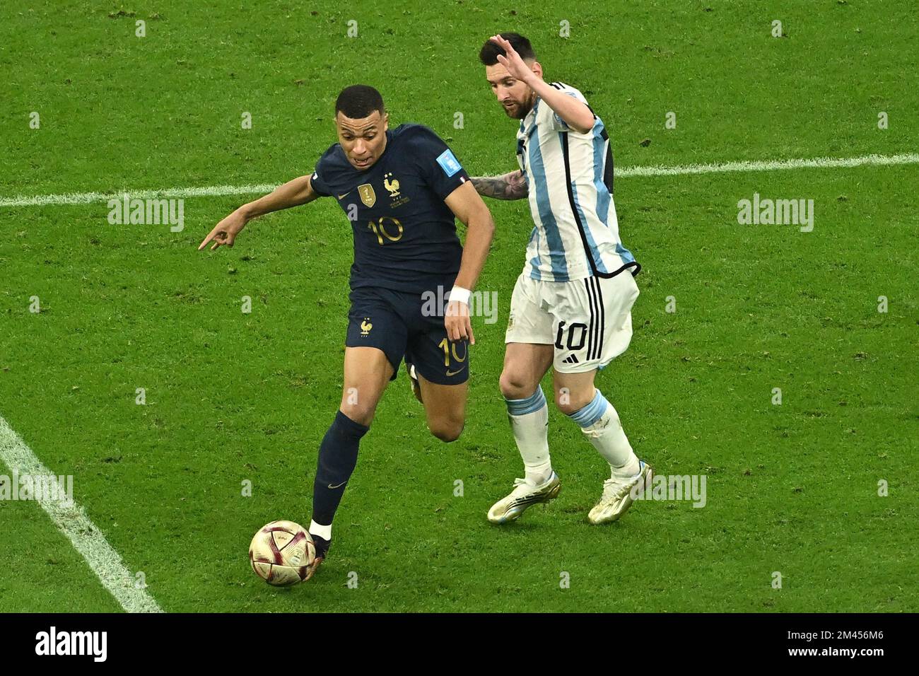 Kylian Mbappe of France and Lionel Messi of Argentina during Argentina