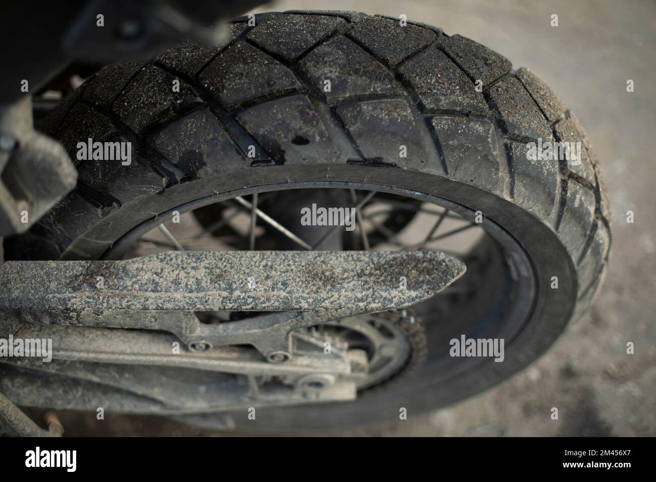 Bicycle wheel. Vehicle wheel parts. Bike in parking lot. Mechanical