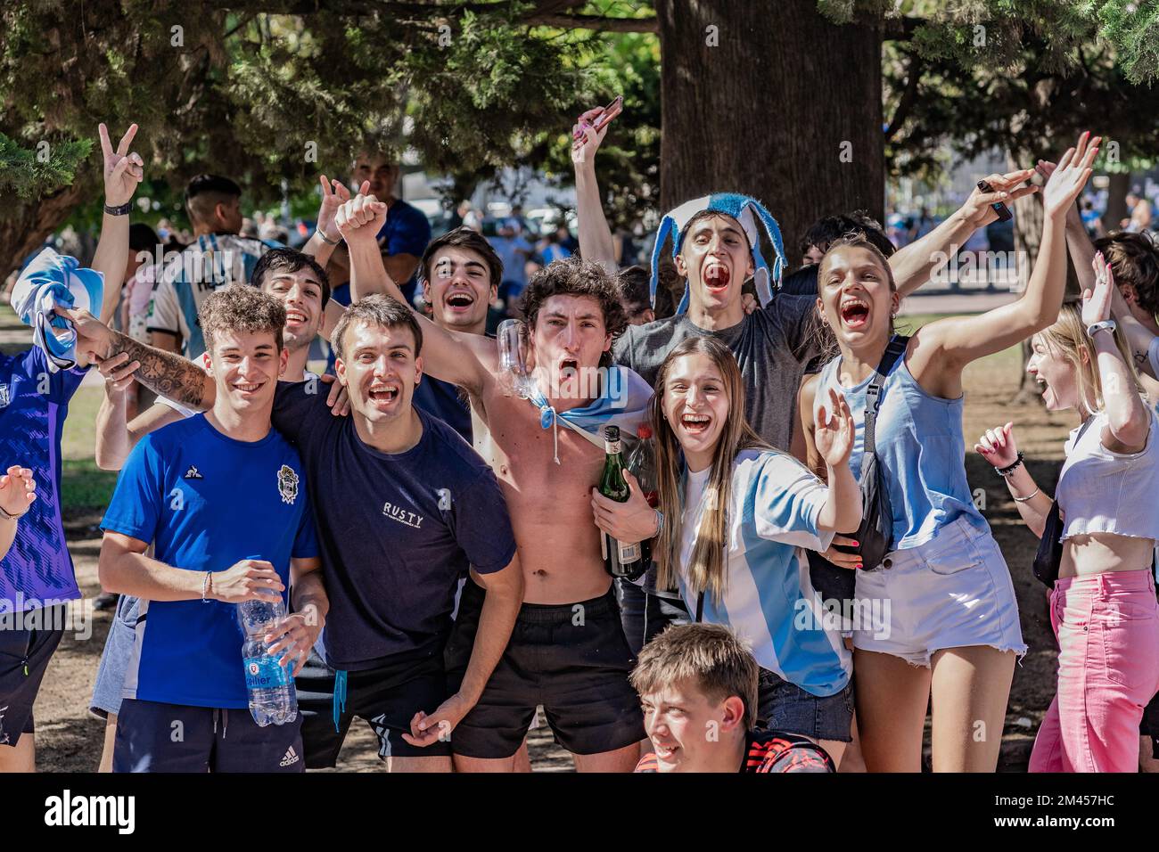 La Plata, Buenos Aires, Argentina - December 18, 2022: A group of friends celebrate Argentina winning the 2022 FIFA World Cup in Qatar. Stock Photo