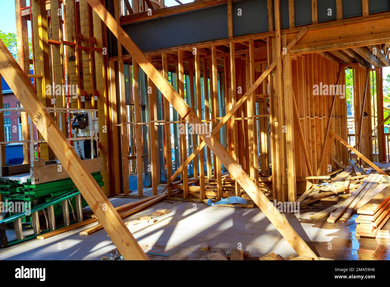 View the building construction wood framing beams of a new house under construction Stock Photo