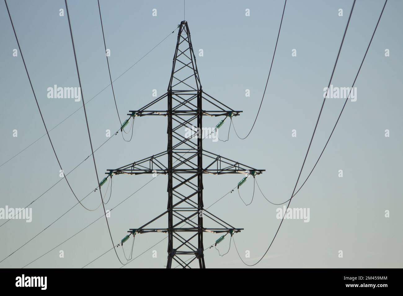 Electrical wires and pole. City light. Electric infrastructure in city. Lots of wires against