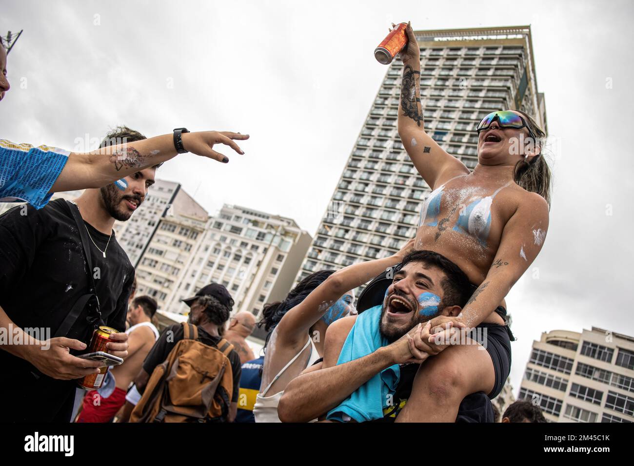EDITORS NOTE: Image contains nudity) Argentines and supporters of Argentina  celebrate the victory in the World Cup final on Copacabana beach in Rio de  Janeiro. On the occasion of the World Cup
