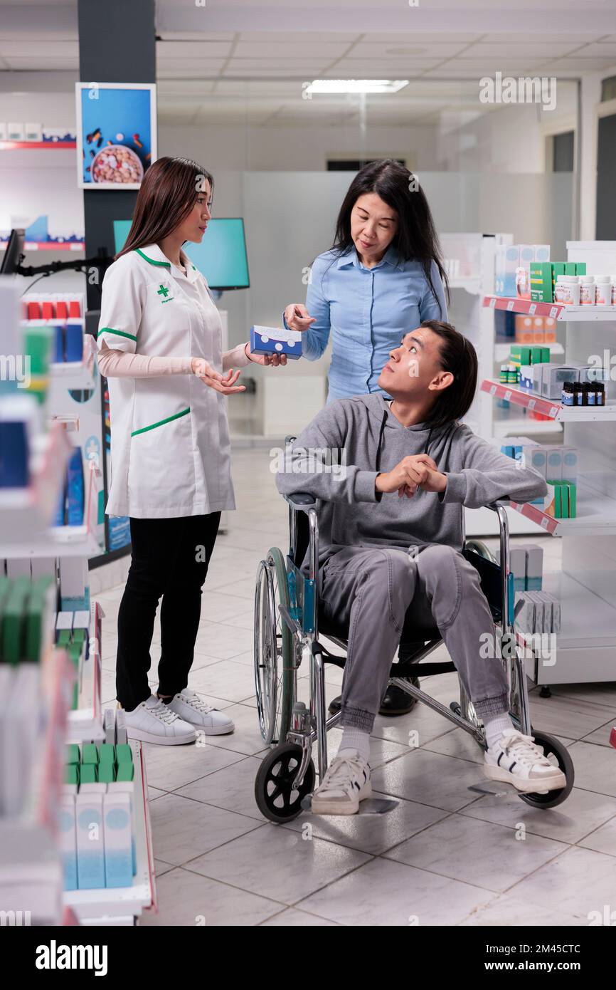 Team of asian people discussing about medication and prescription drugs