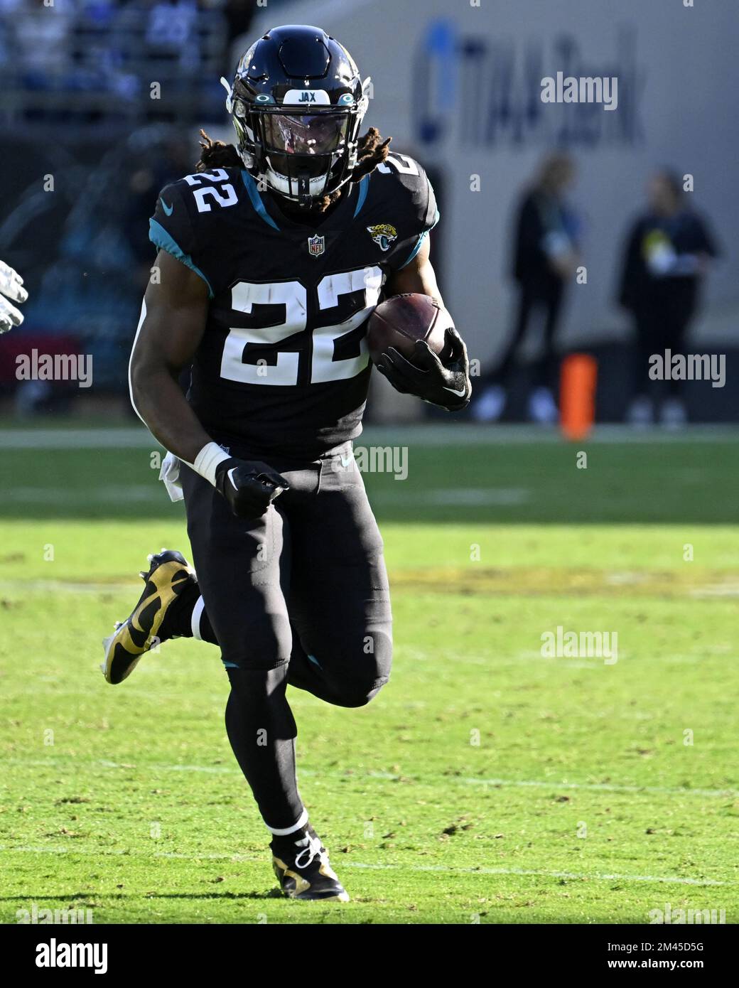 Jacksonville Jaguars running back JaMycal Hasty (22) runs after catching a  screen pass during the second half of an NFL football game against the  Baltimore Ravens, Sunday, Nov. 27, 2022, in Jacksonville