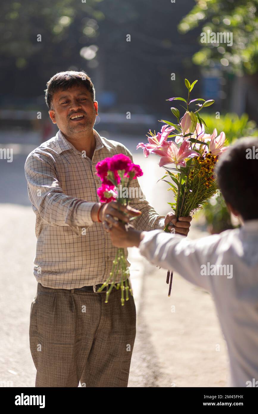 Portrait of a male florist selling flowers Stock Photo Alamy