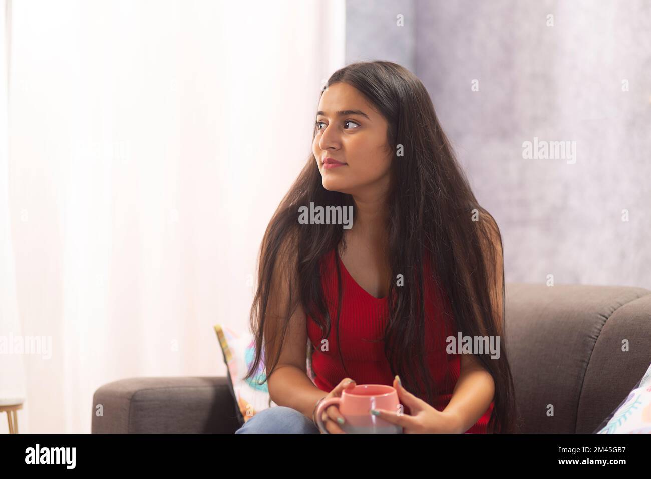 Young indian girl sitting hot hi-res stock photography and images - Alamy