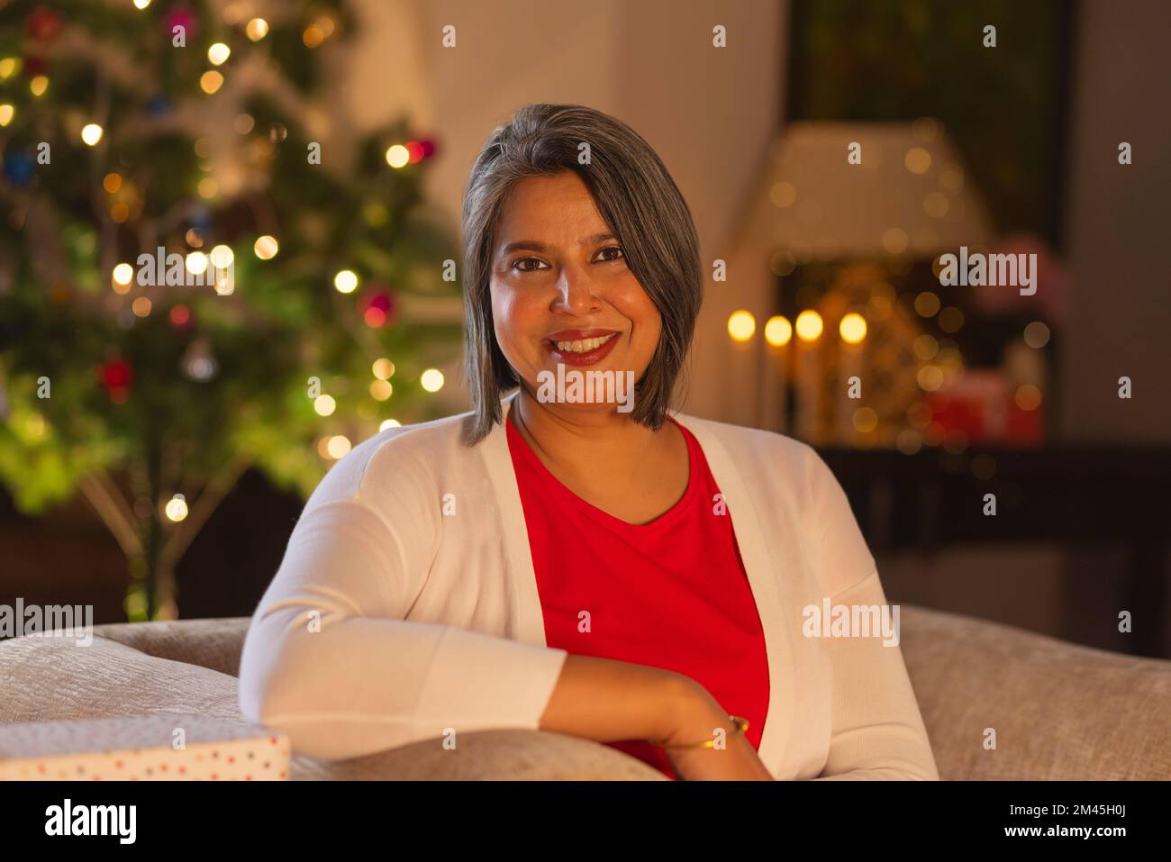 Portrait of a cheerful senior woman looking at camera Stock Photo
