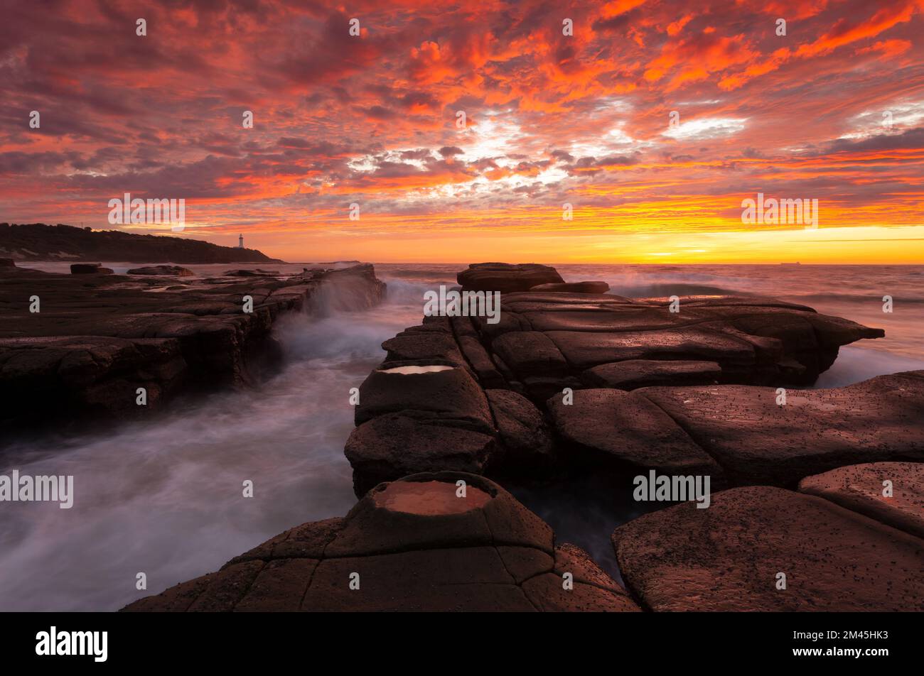 A beautiful sky full of fiery red and yellow at Soldiers Point in