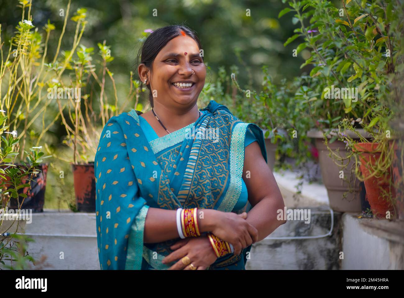 portrait of a smiling  indian house maid Stock Photo