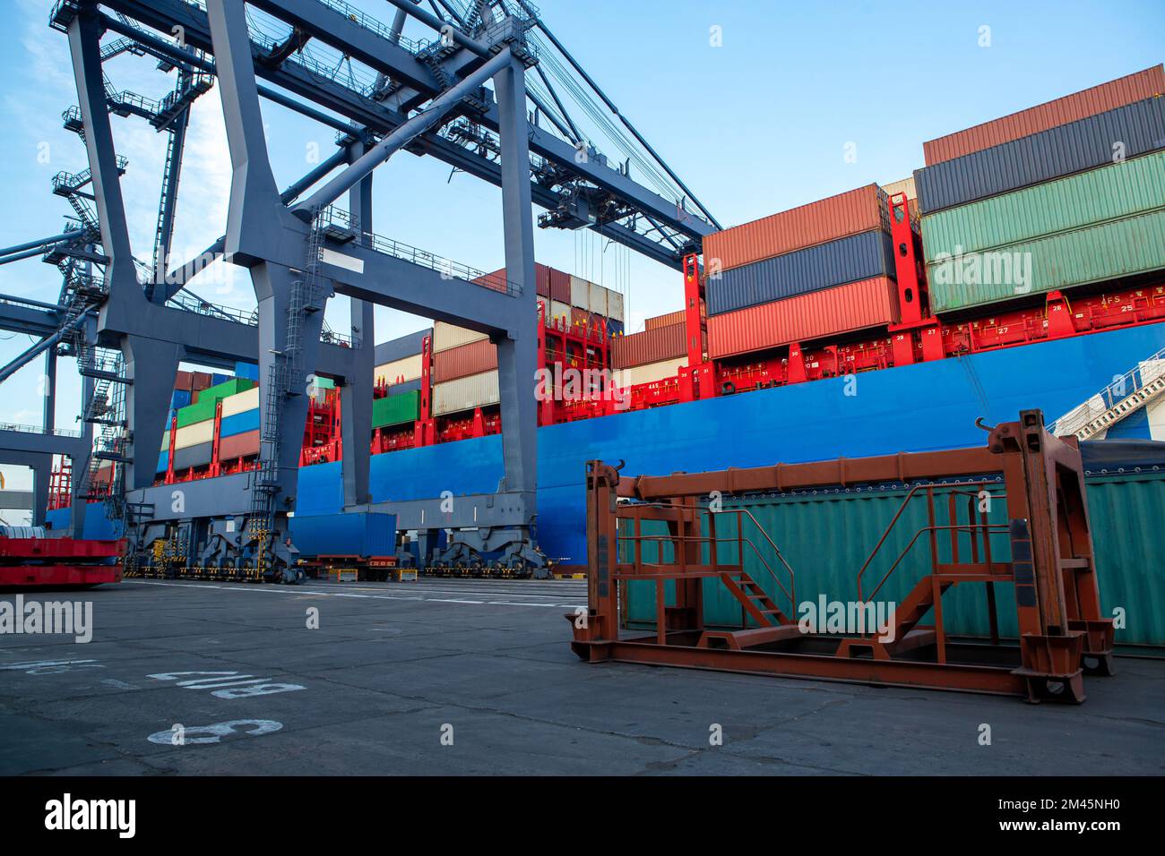 Container ship in port at container terminal. Ships of container ships ...