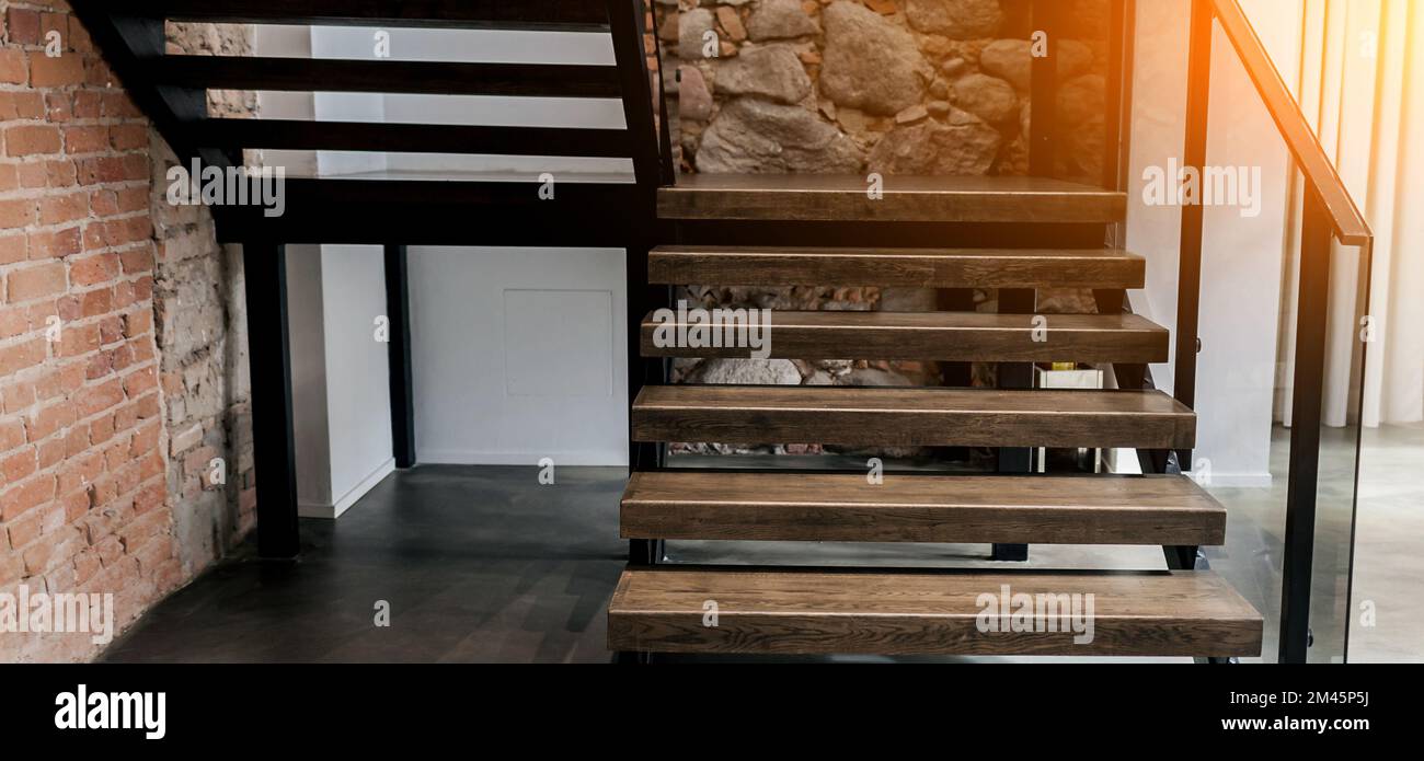 Image showcasing Modern wooden stairs in loft interior. Wood staircase Stock Photo - Alamy