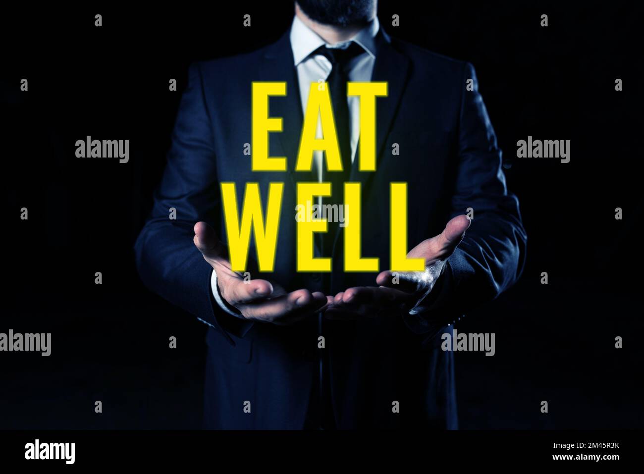 Hand writing sign Eat Well. Word Written on Practice of eating only ...