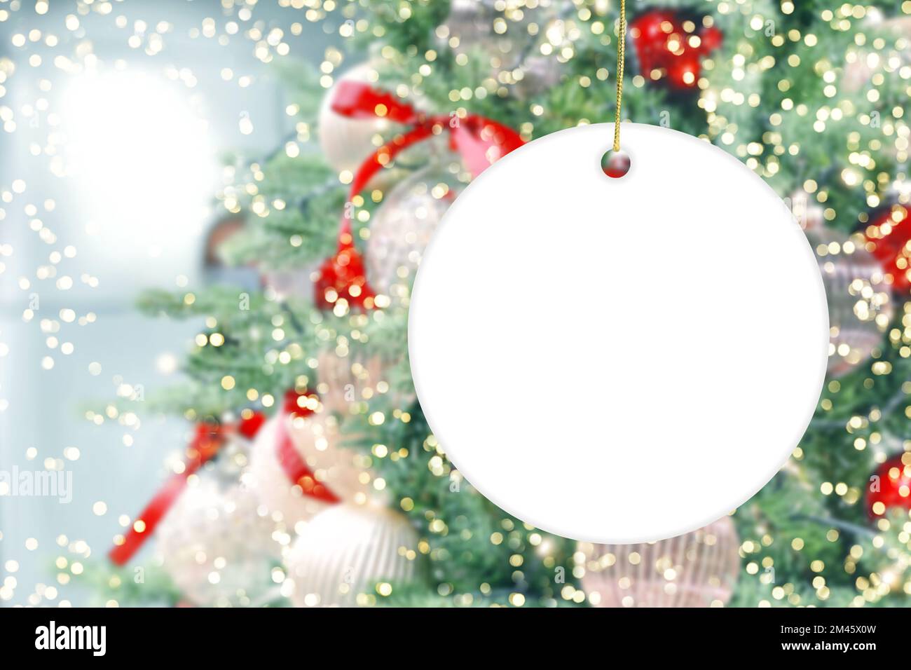 Christmas round ornament mockup golden lights decoration Stock Photo