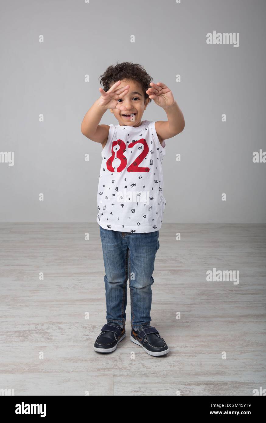 Portrait of an expat arab boy Stock Photo - Alamy