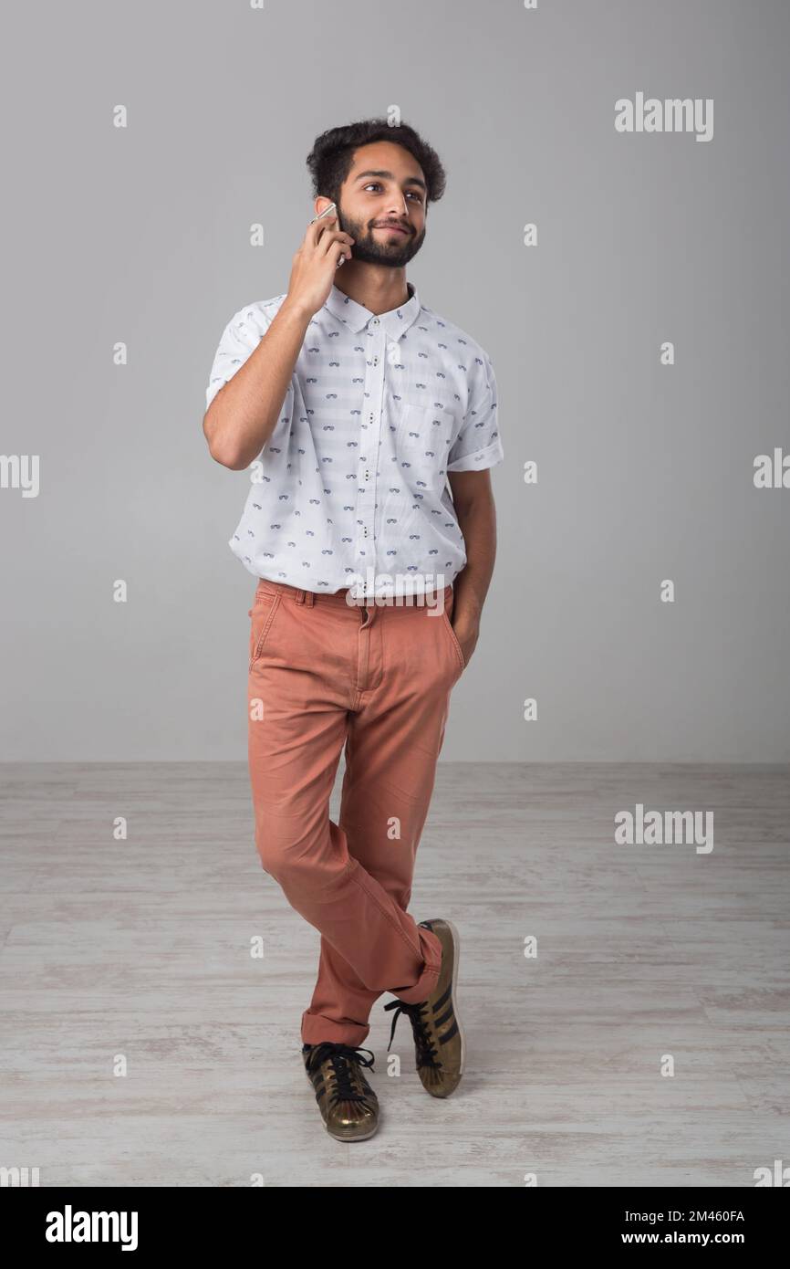 Portrait Of An Expat Arab Talking On The Phone Stock Photo Alamy