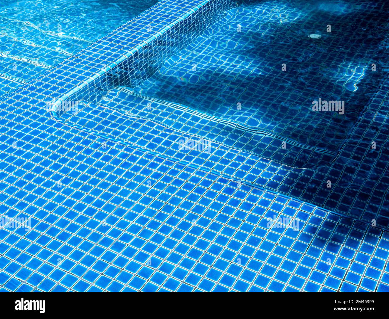 Swimming pool steps with clear water surface background, nobody