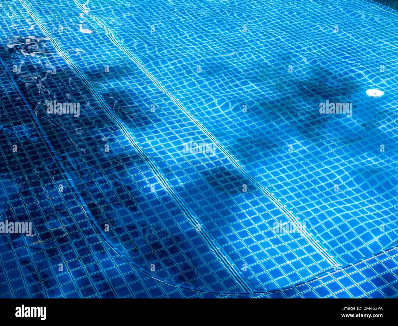 Swimming pool steps with clear water surface background, nobody