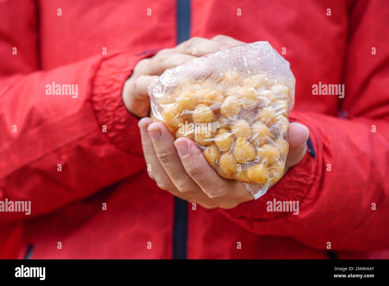 Hand holding bag hi-res stock photography and images - Alamy