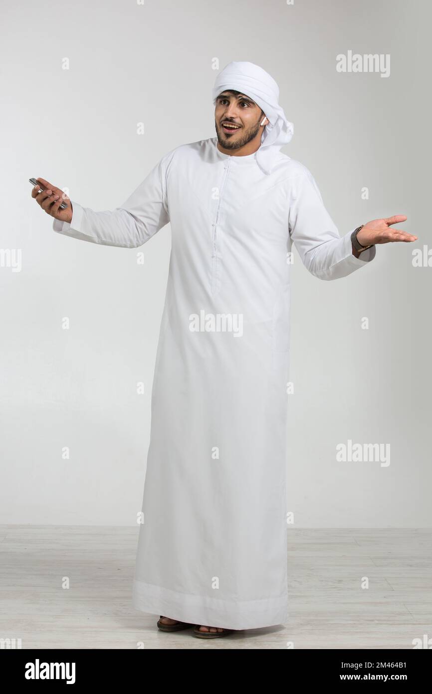 Emirati man talking on his mobile. Stock Photo