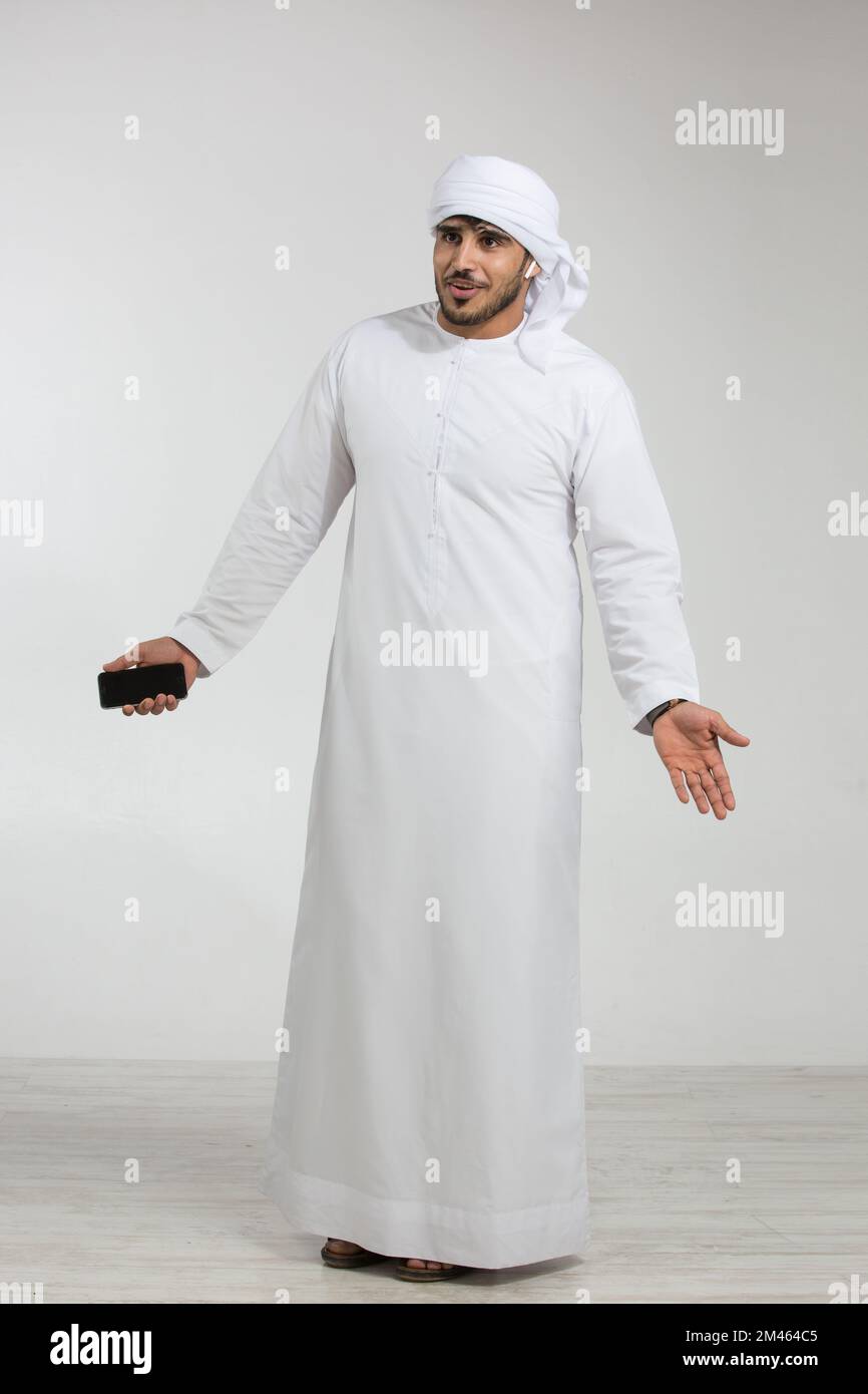 Emirati man talking on his mobile. Stock Photo
