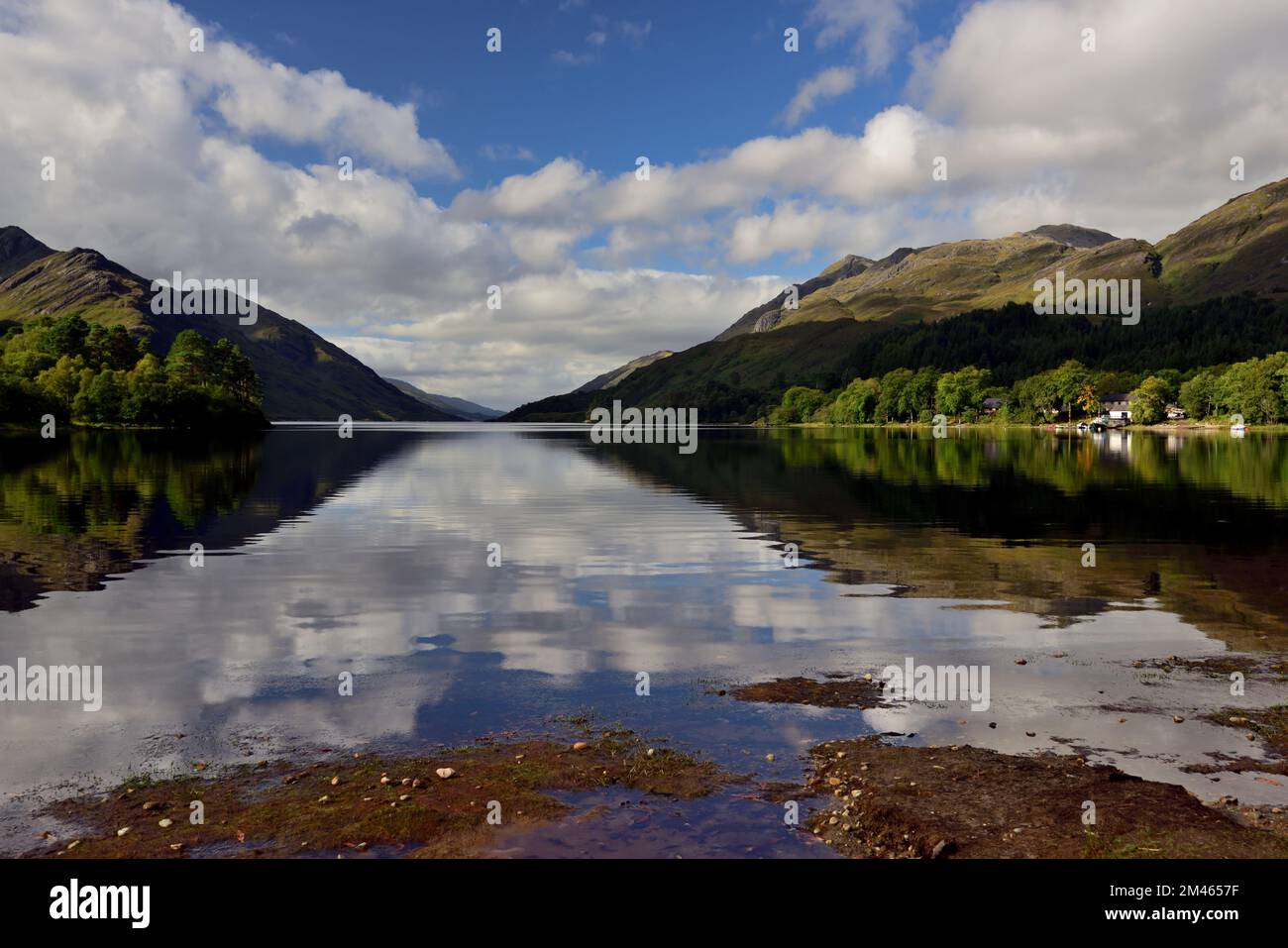 Reflections in Loch Shiel at Glenfinnan in the Scottish Highlands. Stock Photo