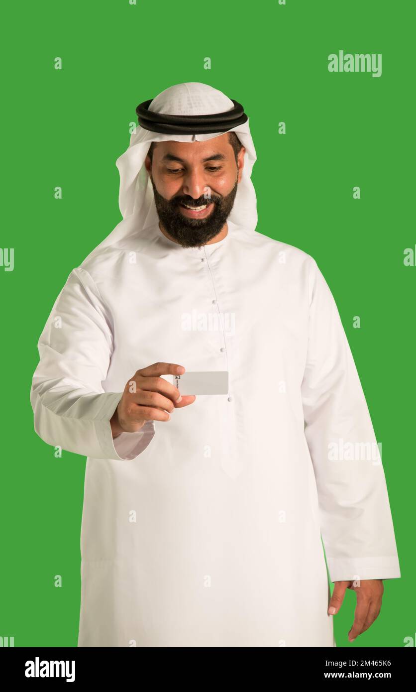 Arab man holding a credit card Stock Photo Alamy
