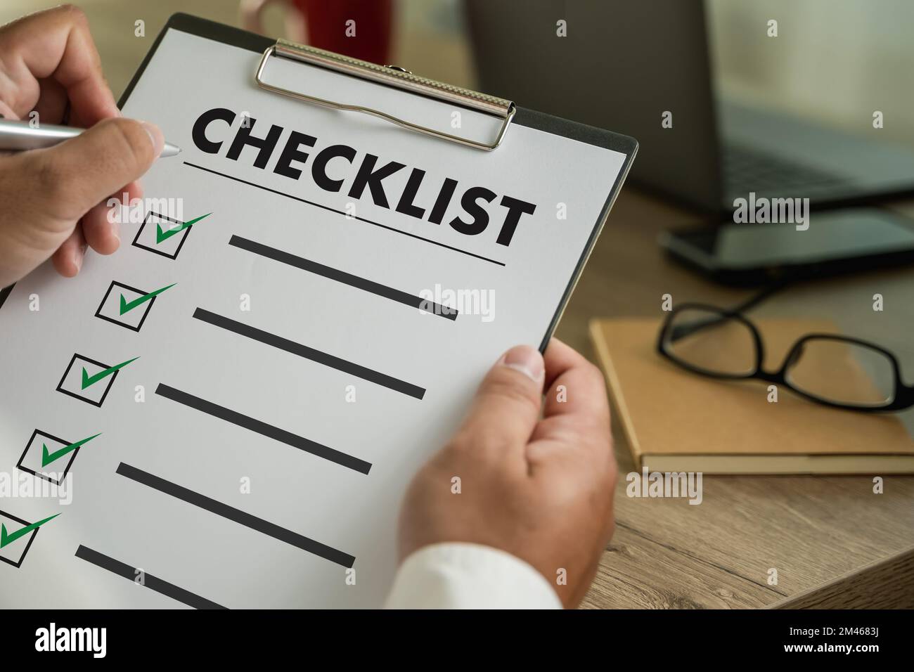 Checklist Notice Remember Planning Concept businessman writer checklist questionnaire Stock