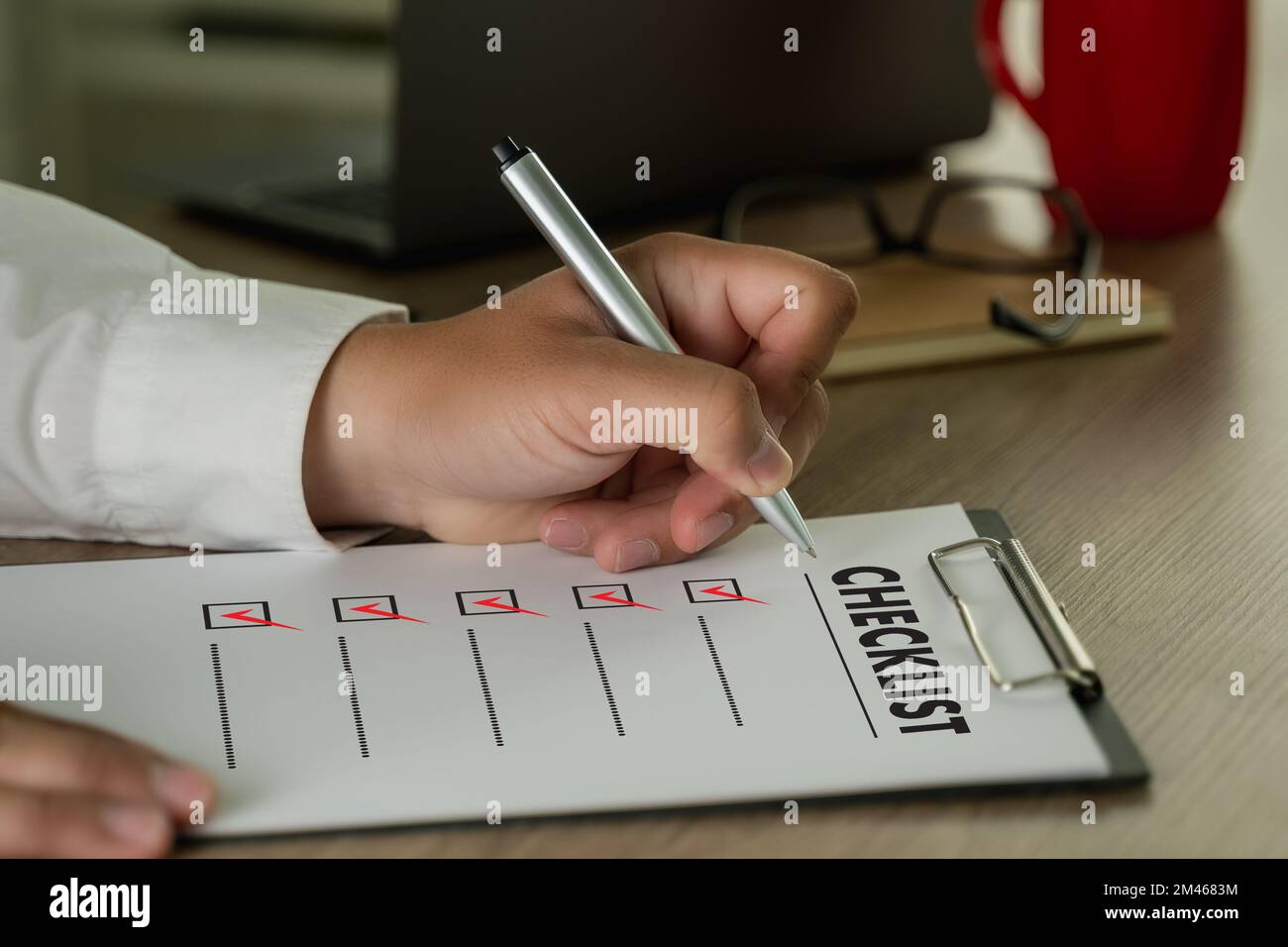 Checklist Notice Remember Planning Concept businessman writer checklist questionnaire Stock