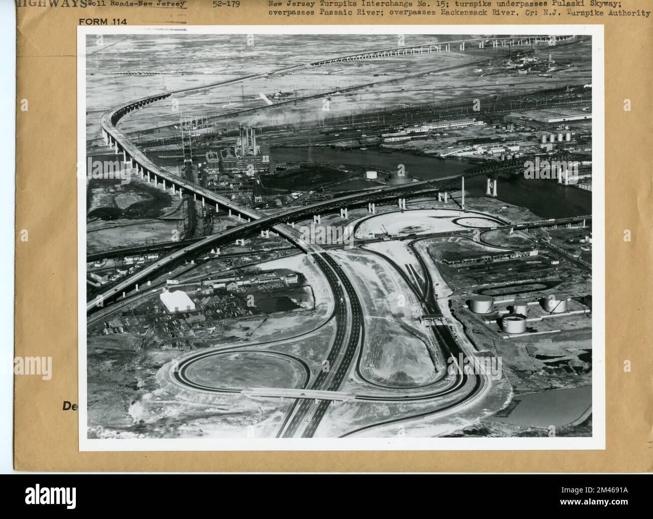 New Jersey Turnpike Interchange No. 15. Original caption: New Jersey Turnpike Interchange No. 15; turnpike underpasses Pulaski Skyway; overpasses Passaic River; overpasses Hackensack River. Credit: NJ Turnpike Authority. State: New Jersey. Stock Photo