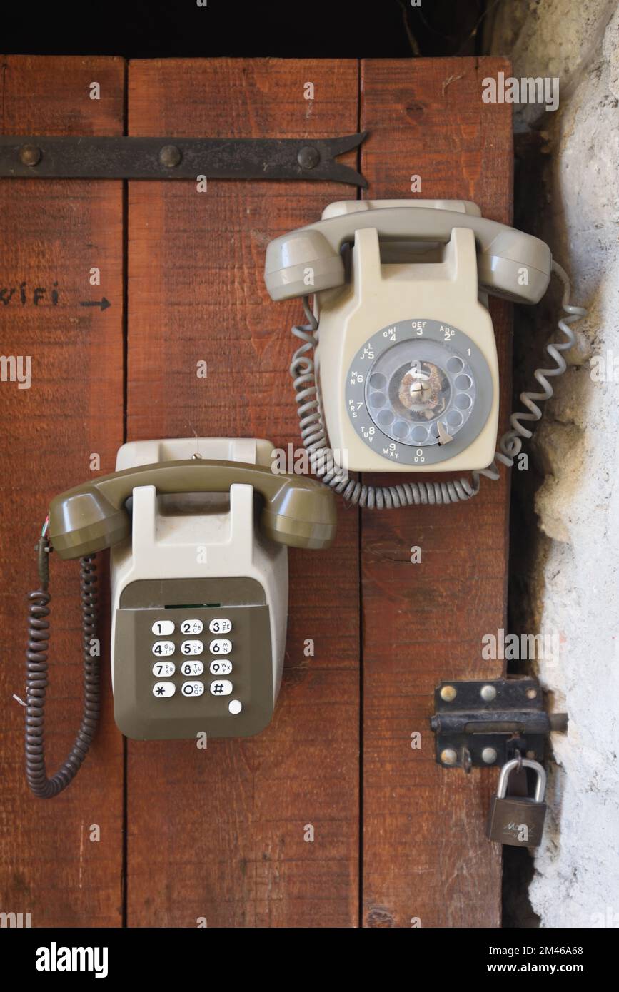 Vintage Push Button Telephone or Phone and Ring Dial Telephone Stock Photo