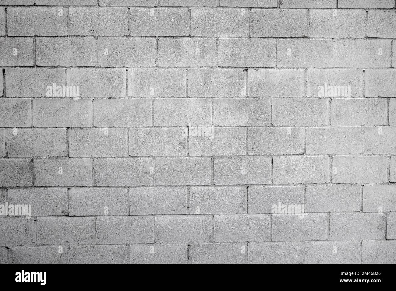 Cinder block wall background texture. Grunge backdrop wallpaper Stock