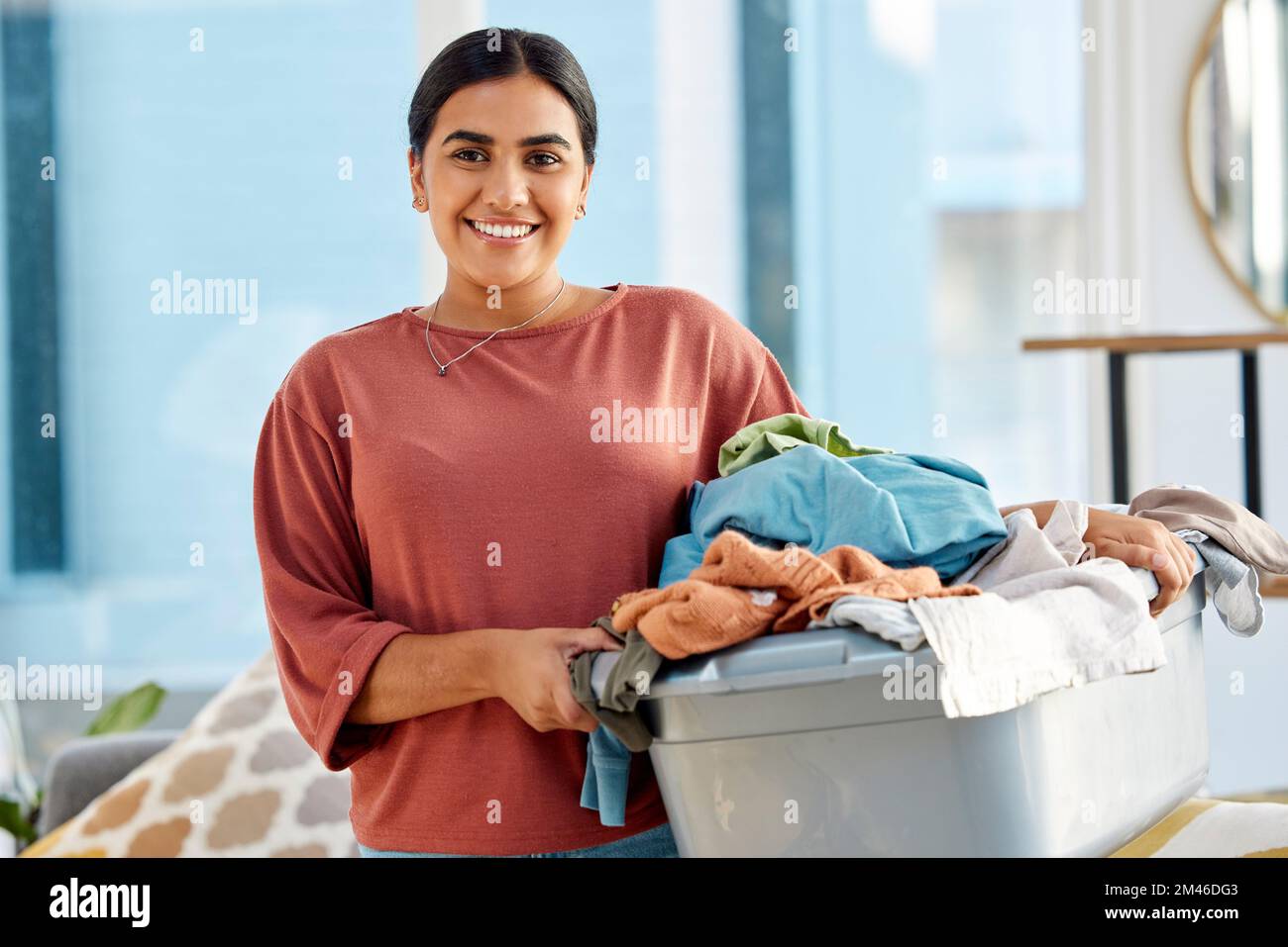 Cleaning, cleaner and woman with laundry, clothes washing and cleaner