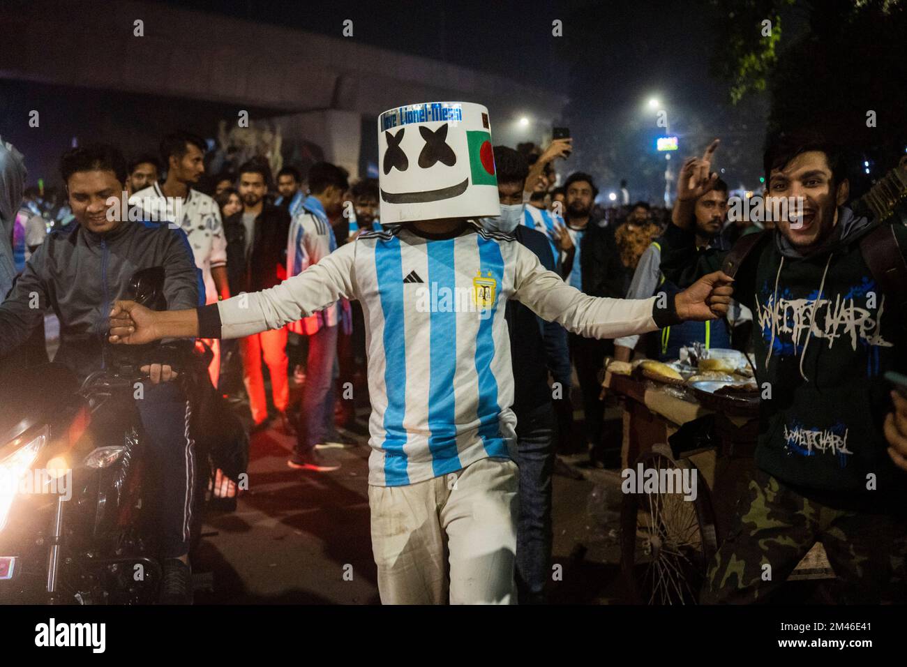 Dhaka, Bangladesh. 19th Dec, 2022. A fan dressed as Marshmello dances
